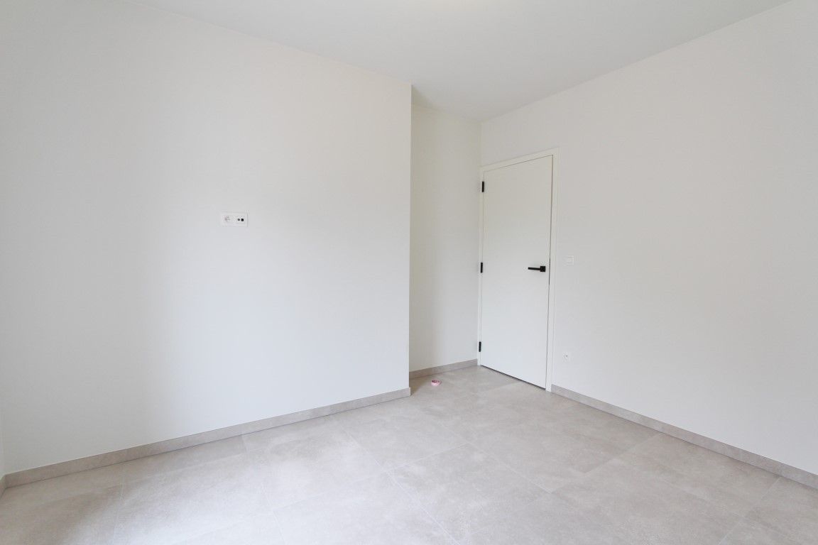 Nieuwbouw éénslaapkamerappartement in het centrum van Sint-Truiden! foto 17