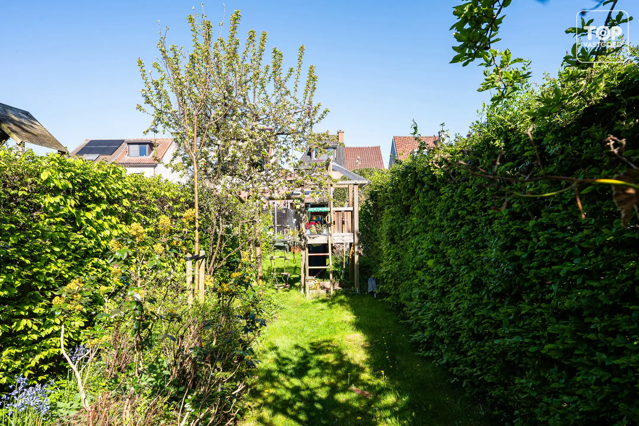 Instapklare woning met 4 slaapkamers, garage en prachtige tuin.  foto 13