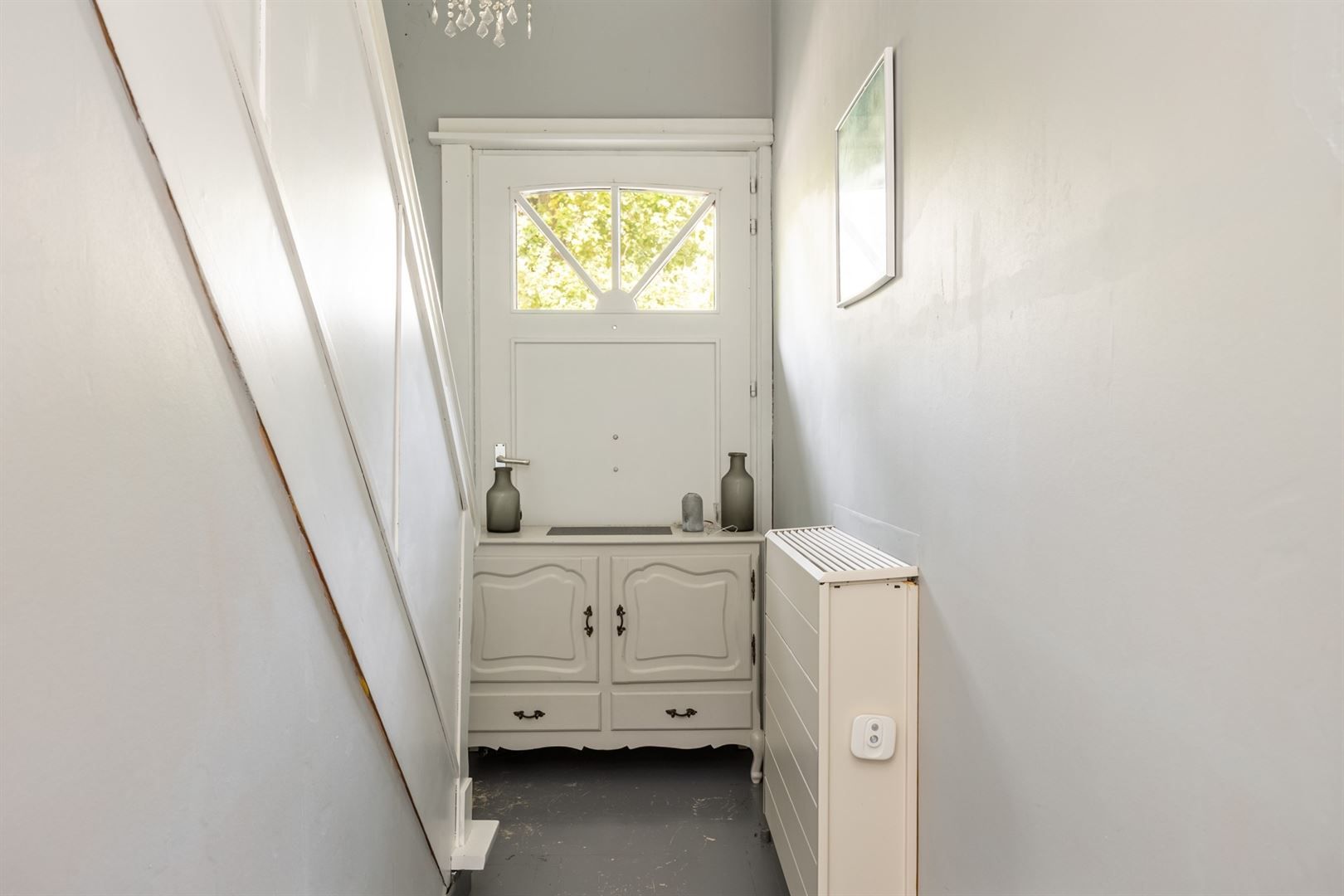 Instapklare halfopen woning met zonnige tuin aan de Vaart Schoten foto 13