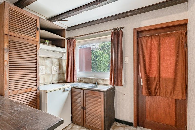 Charmante, te renoveren woning met tuin op 5are foto 22