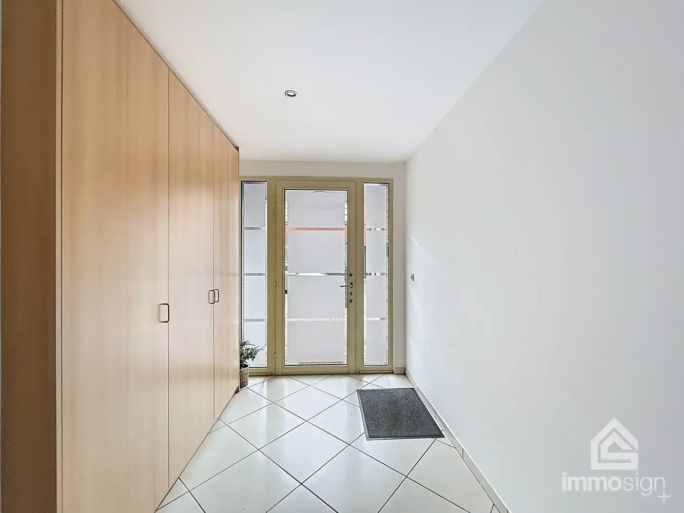 Appartementsgebouw met gelijkvloers- en duplexappartement in Peer centrum! foto 3