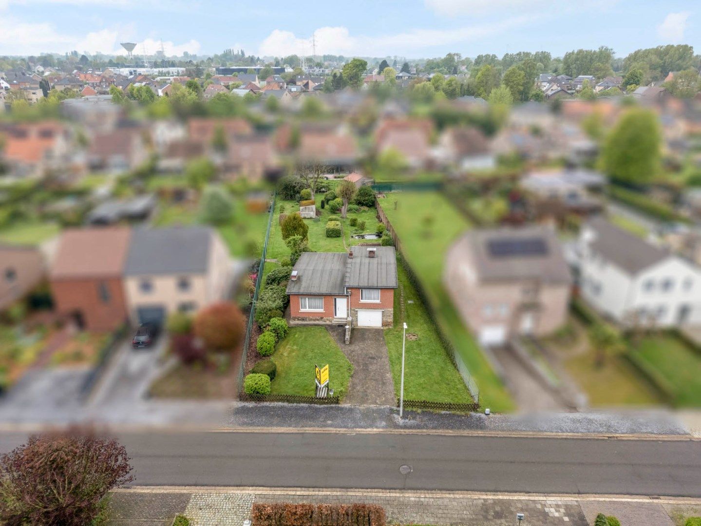 Te renoveren vrijstaande woning op een gunstig gelegen perceel van 12a 07ca vlakbij het centrum foto 35