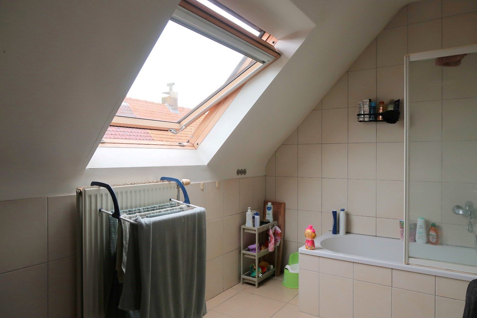 Opbrengsteigendom met 3 appartementen en 3 garageboxen. Ideale investering! foto 19