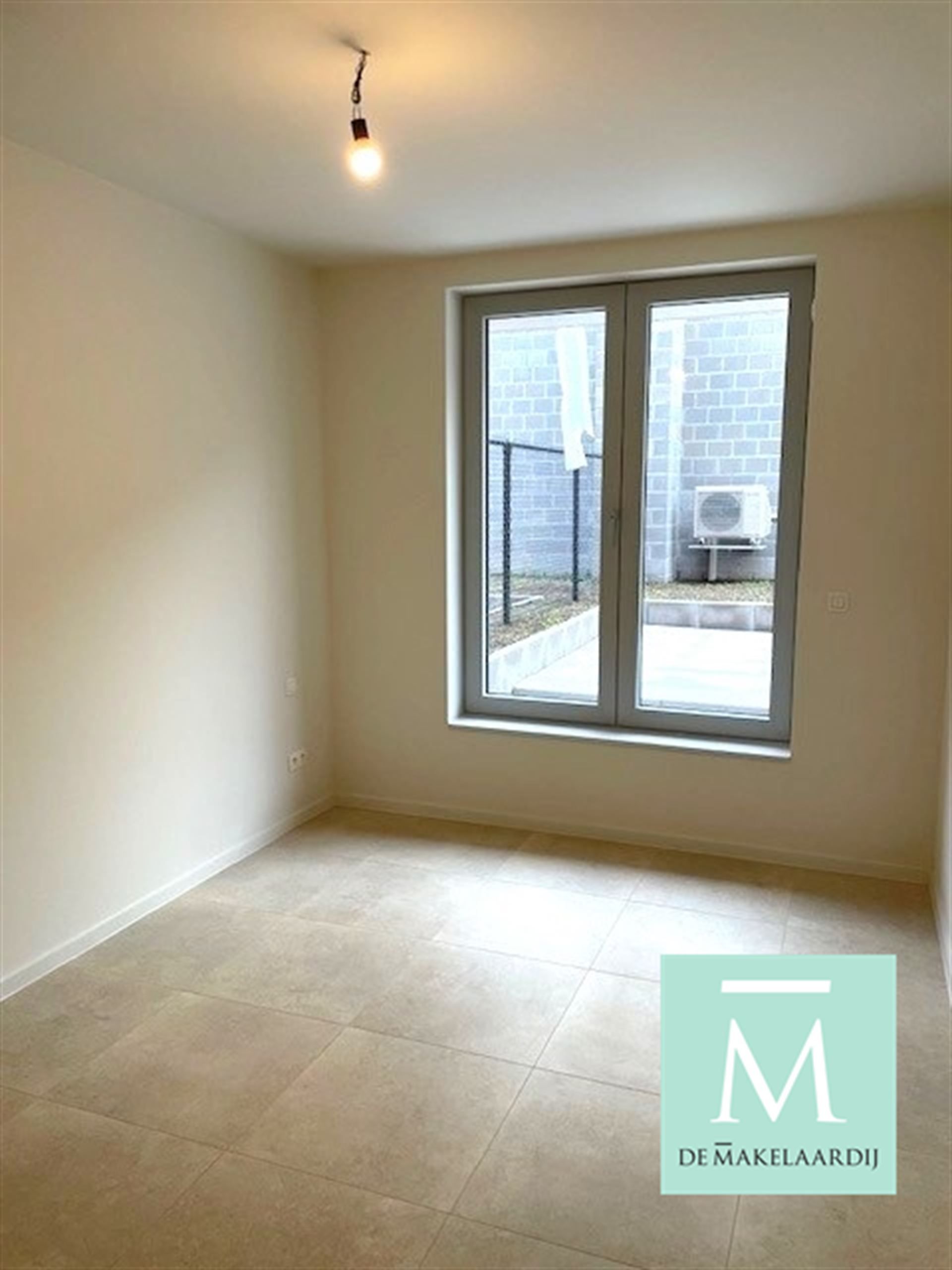 Gelijkvloers nieuwbouwappartement met 2 slaapkamers, terras/tuin op toplocatie! foto 5