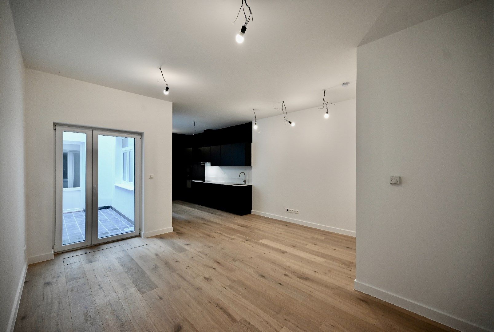 KARAKTERVOL GELIJKVLOERS APPARTEMENT MET STADSTERRASJE foto 2