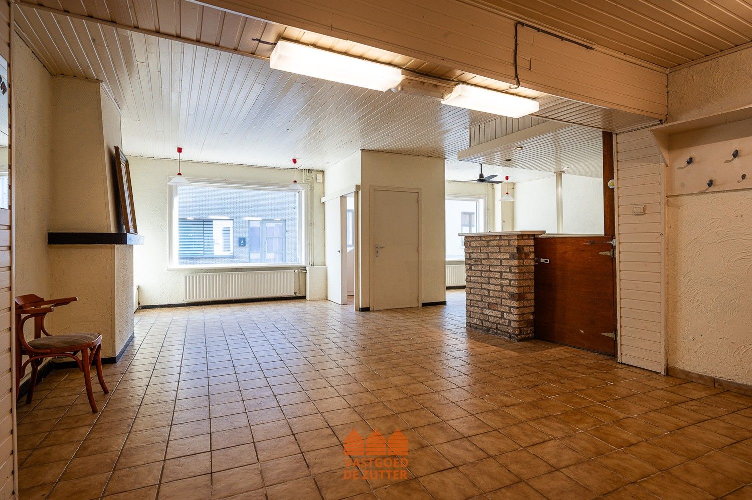 Ruime woning met handelspand in het centrum van Boekhoute foto 21