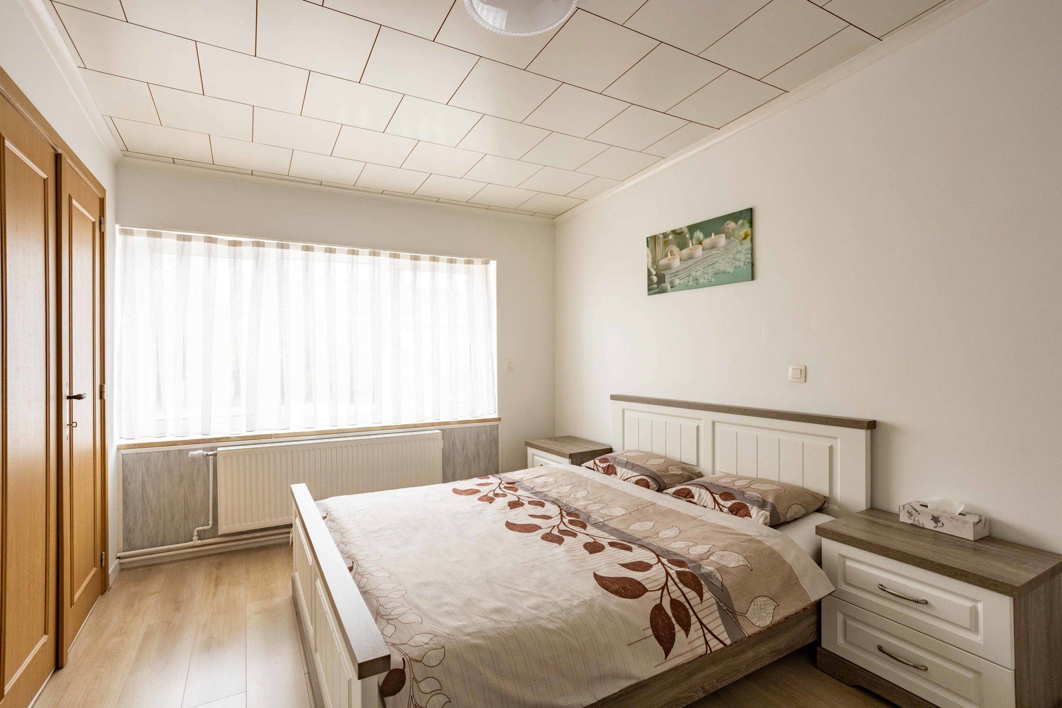 Gezinswoning met 4 slaapkamers, tuin en achteruitweg  foto 14