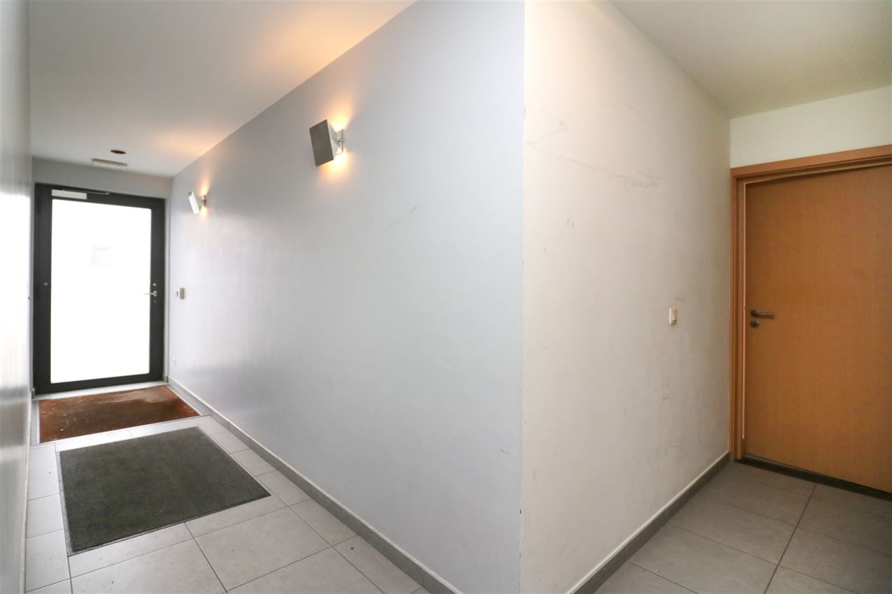 Gelijkvloers app met 1 slpk, terras, nabij station foto 18