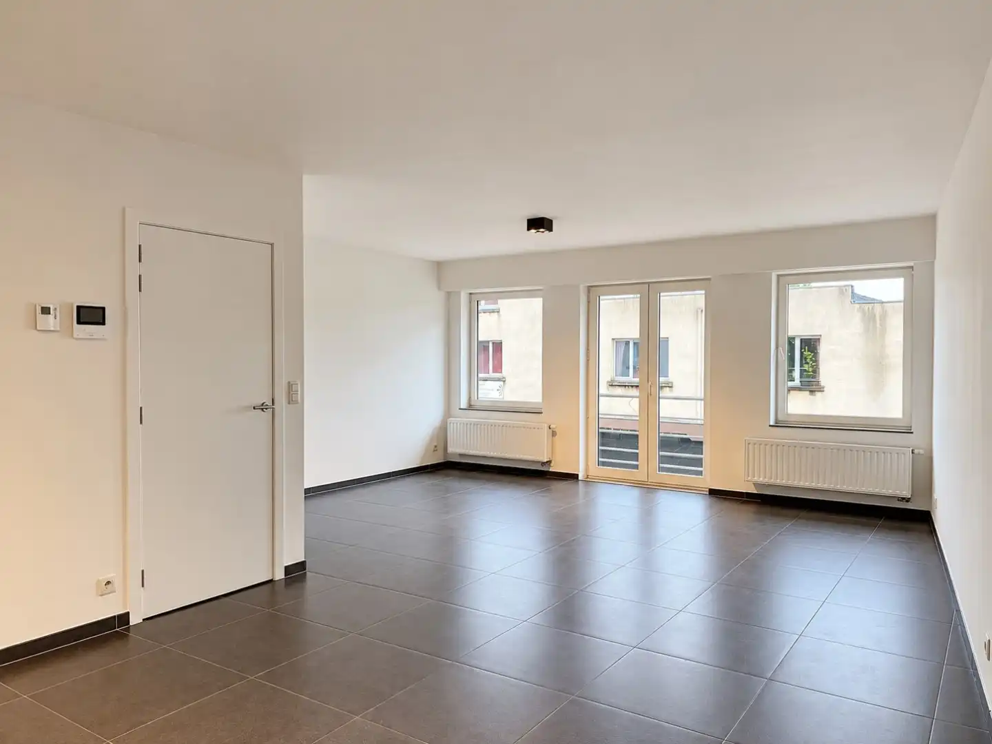 Ruim en instapklaar duplexappartement met 3 slaapkamers en garage in hartje Waarschoot foto 7