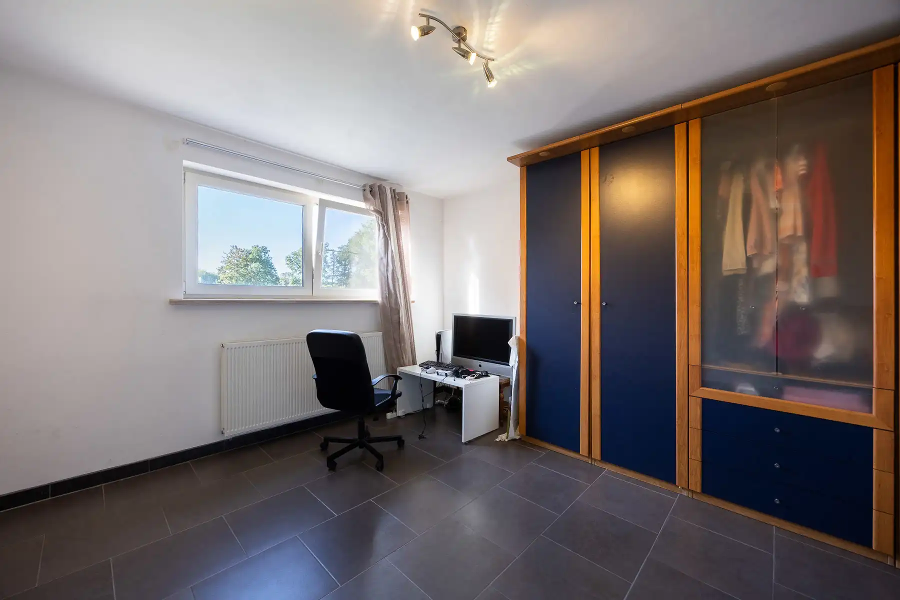 Ruime energiezuinige woning met 6 SLPK's en diepe tuin foto 19