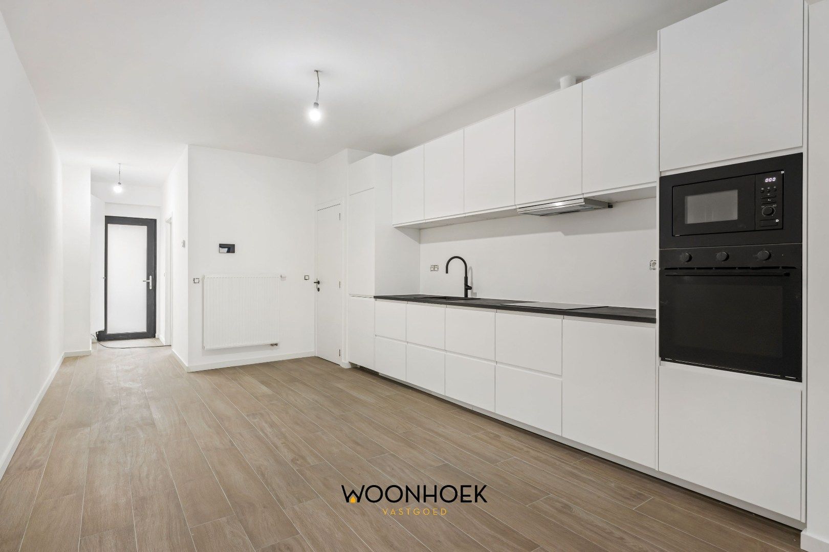 Gerenoveerde, 4-slpk woning met 2 badkamers en tuin! foto 6