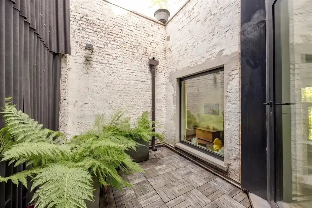 Unieke woning met eclectische gevels en dakterras foto 13
