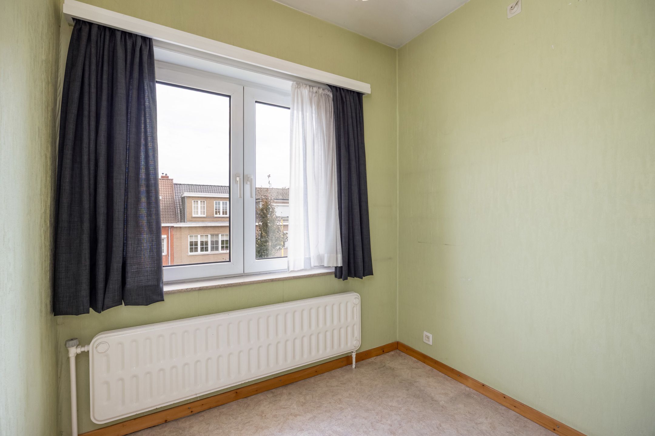 Te renoveren woning met zicht op velden in Grimbergen foto 10