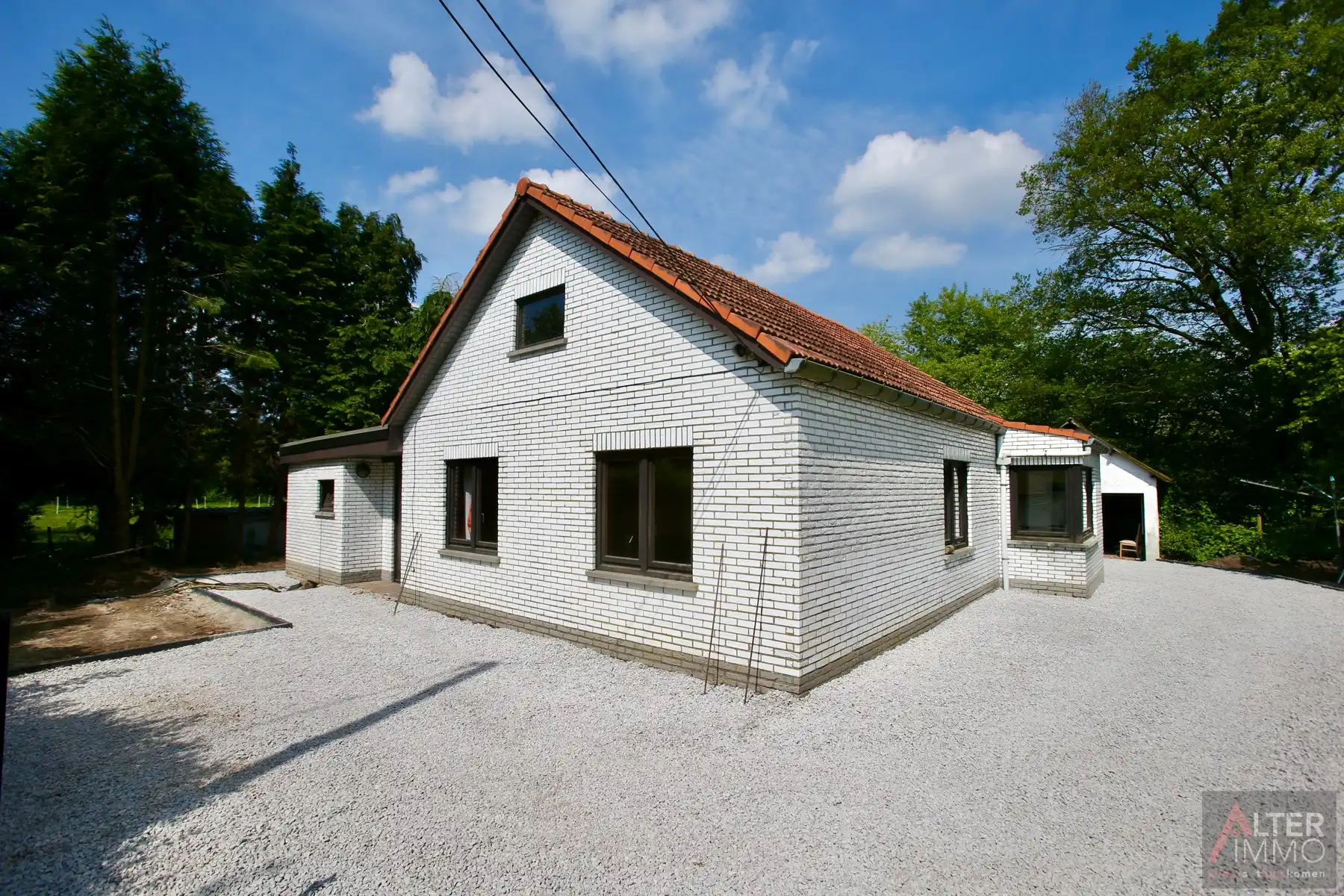 Gelijkvloerse woning (1970) met 2 slaapkamers, kelder en zolder (mogelijks in te richten) op perceel van 10a 30ca. foto 15