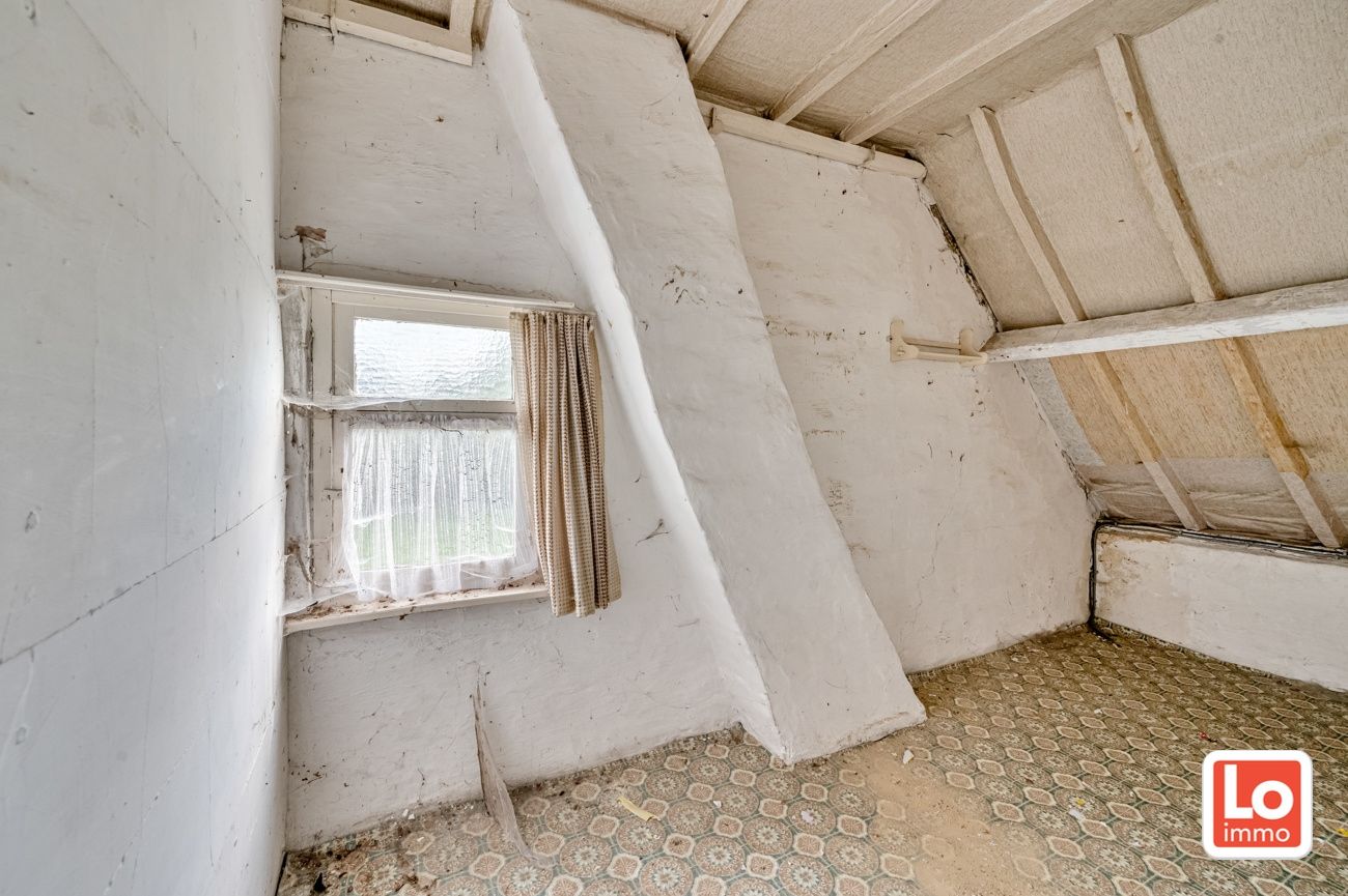 Landelijk gelegen halfopen afbraakwoning op groot perceel grond met open zicht in Zeveneken! foto 19