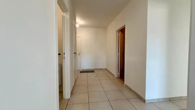 Lichtrijk hoekappartement met 2 slaapkamers en ondergrondse parkeerplaats foto 12