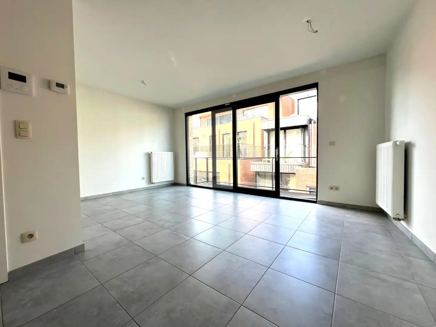 Appartement te Diest : slaapkamer en terras foto 2