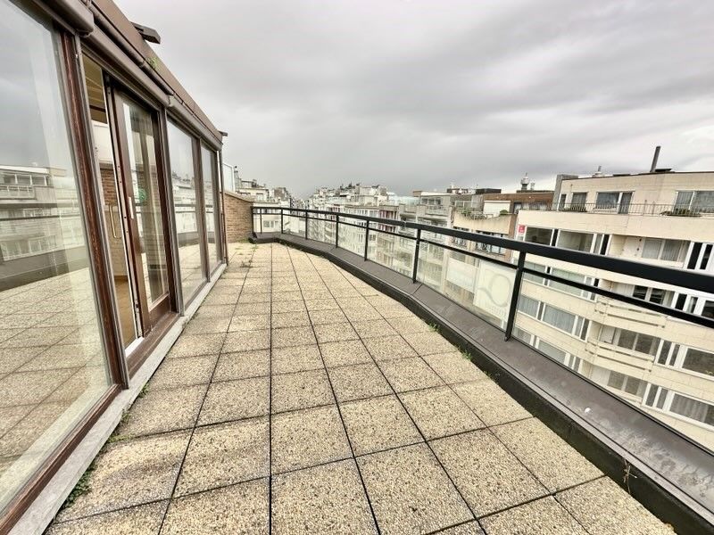 Schitterend gelegen 1 slpk penthouse met royaal dakterras foto 3