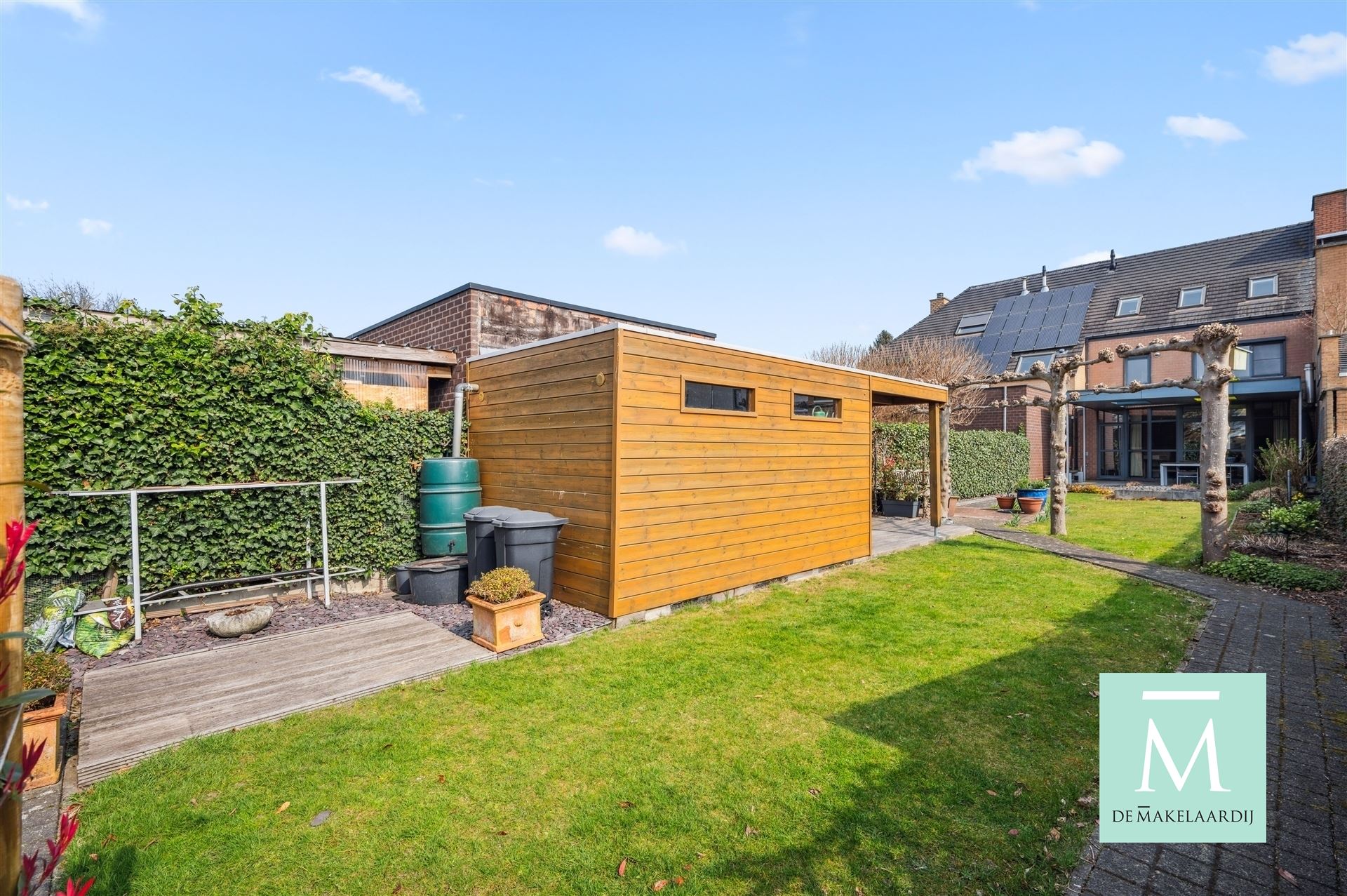 Energiezuinige woning met aangename tuin en garage foto 30