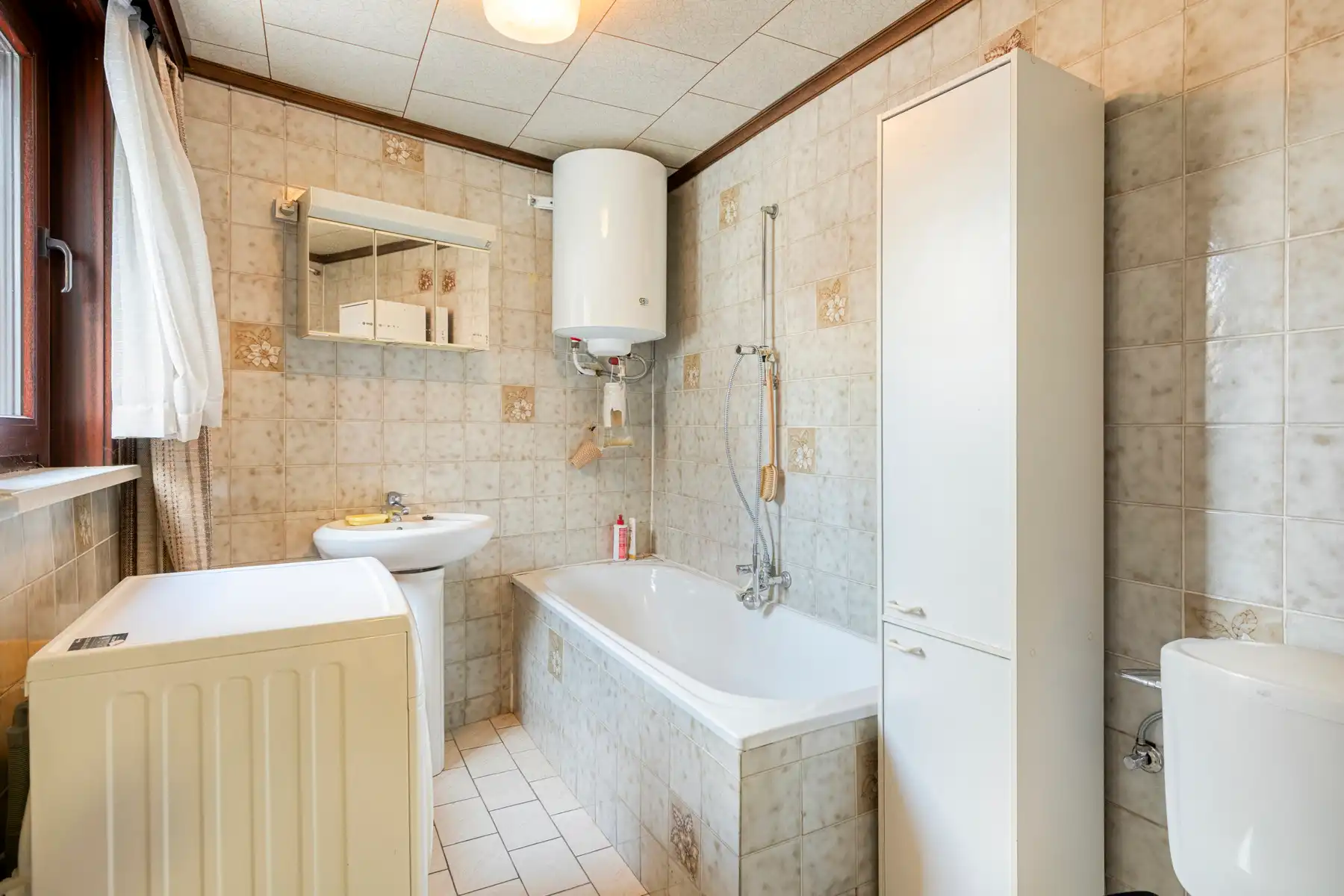 Te renoveren rijwoning met ruim perceel van 445 m²  foto 9