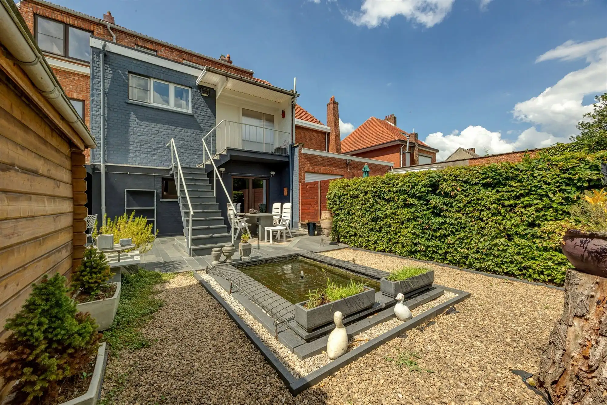 Gedeeltelijk gerenoveerde tweewoonst met tuin en garage foto 10