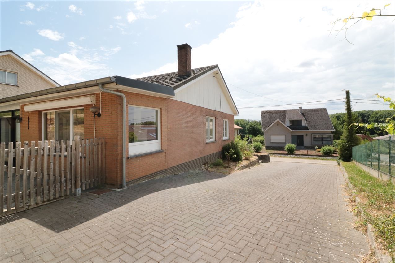 Uniek gelegen woning met 1 grote en 2 kleine slpk., rustige tuin foto 26