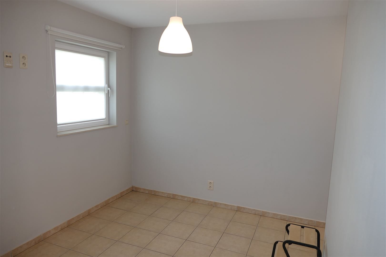 Gelijkvloers appartement met terras en garage foto 12