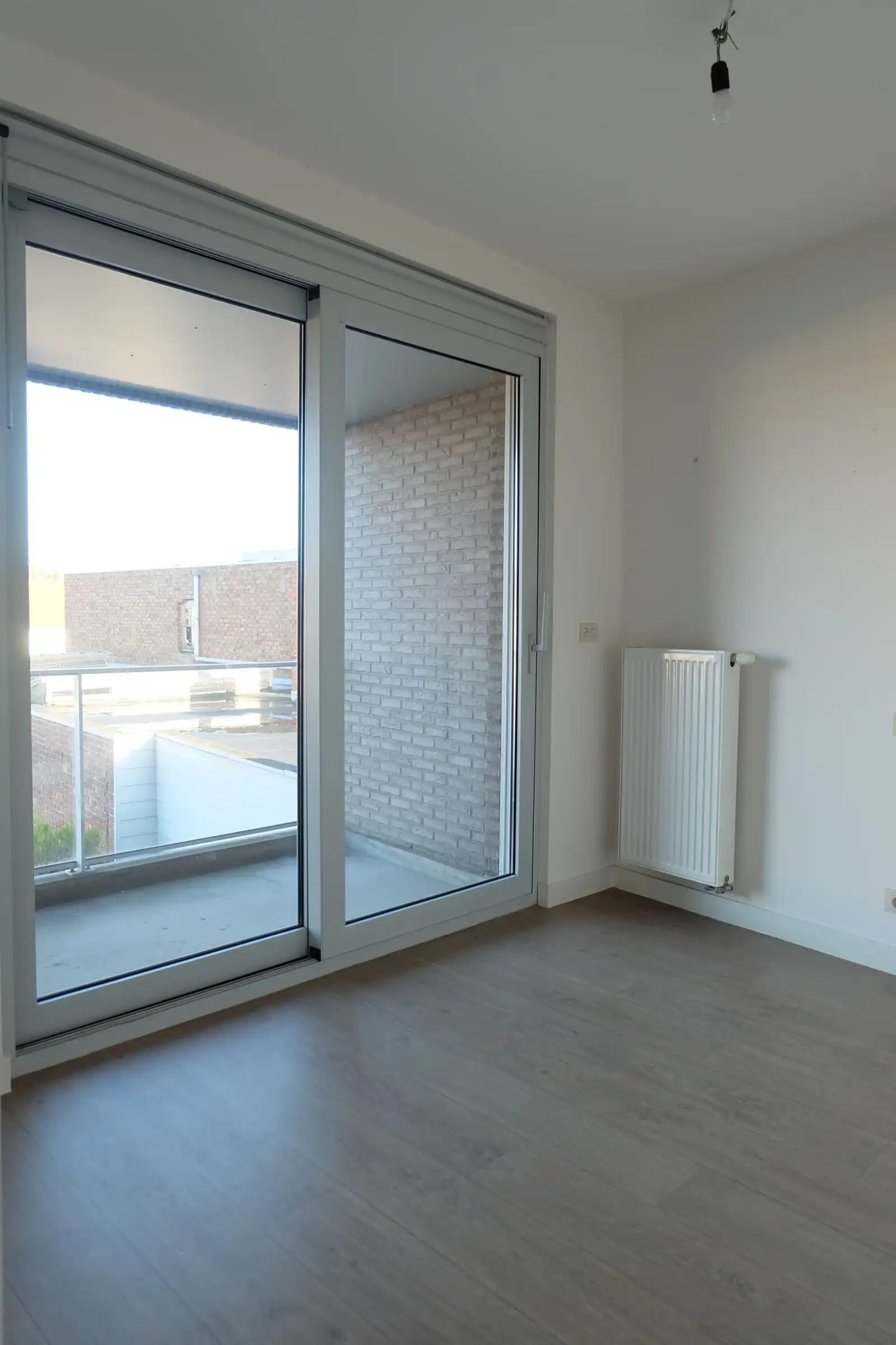 Ruim  3-slaapkamerappartement in hartje Waregem te huur foto 10