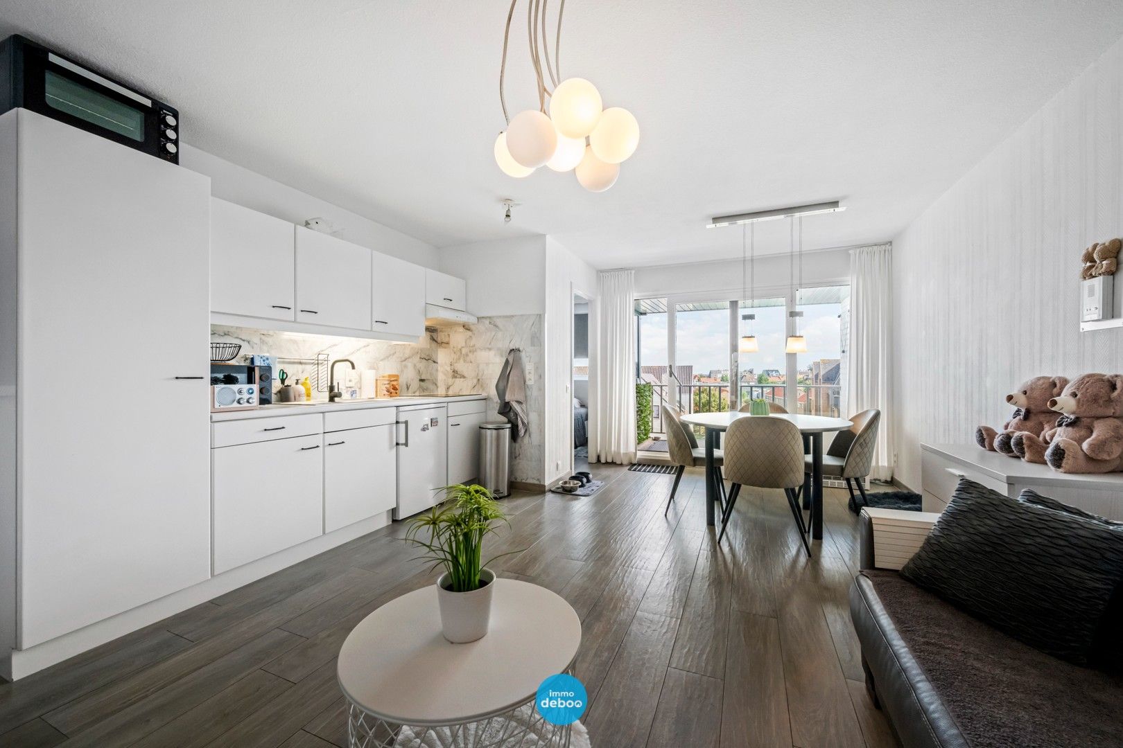 Instapklaar appartement met zonneterras en zijdelings zeezicht foto 2