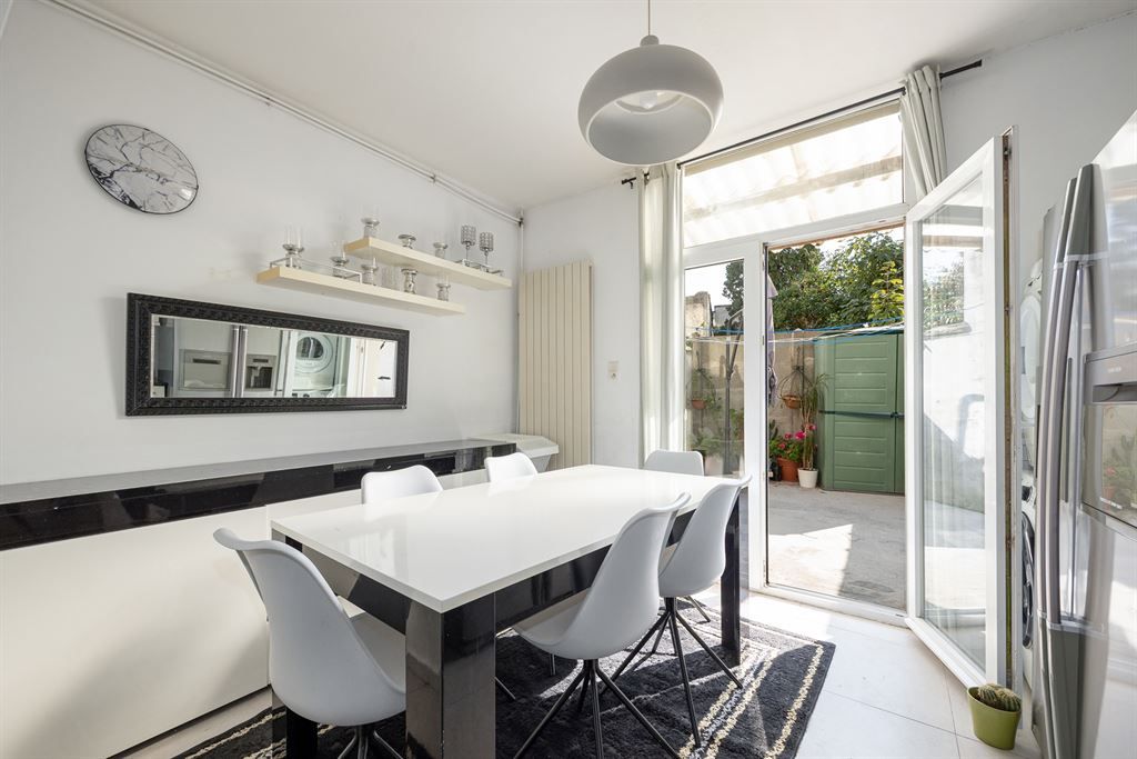 Ruime woning met 4 slaapkamers en stadskoer foto 7