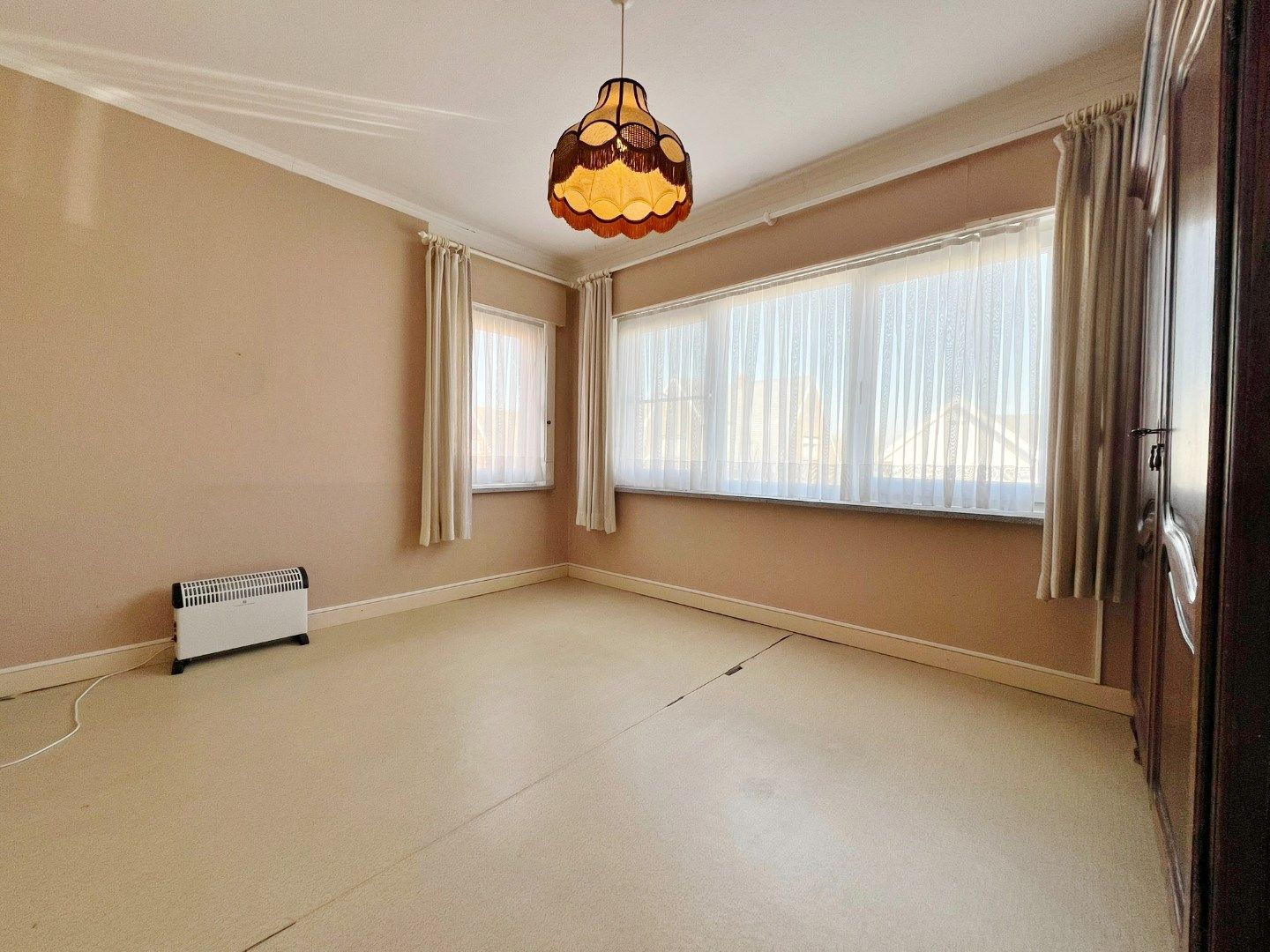 Halfopen woning met zonnige tuin en garage.  foto 11