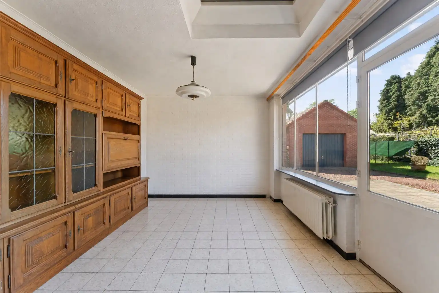 Te renoveren woning met grote tuin en 5 slaapkamers in Genk foto 11