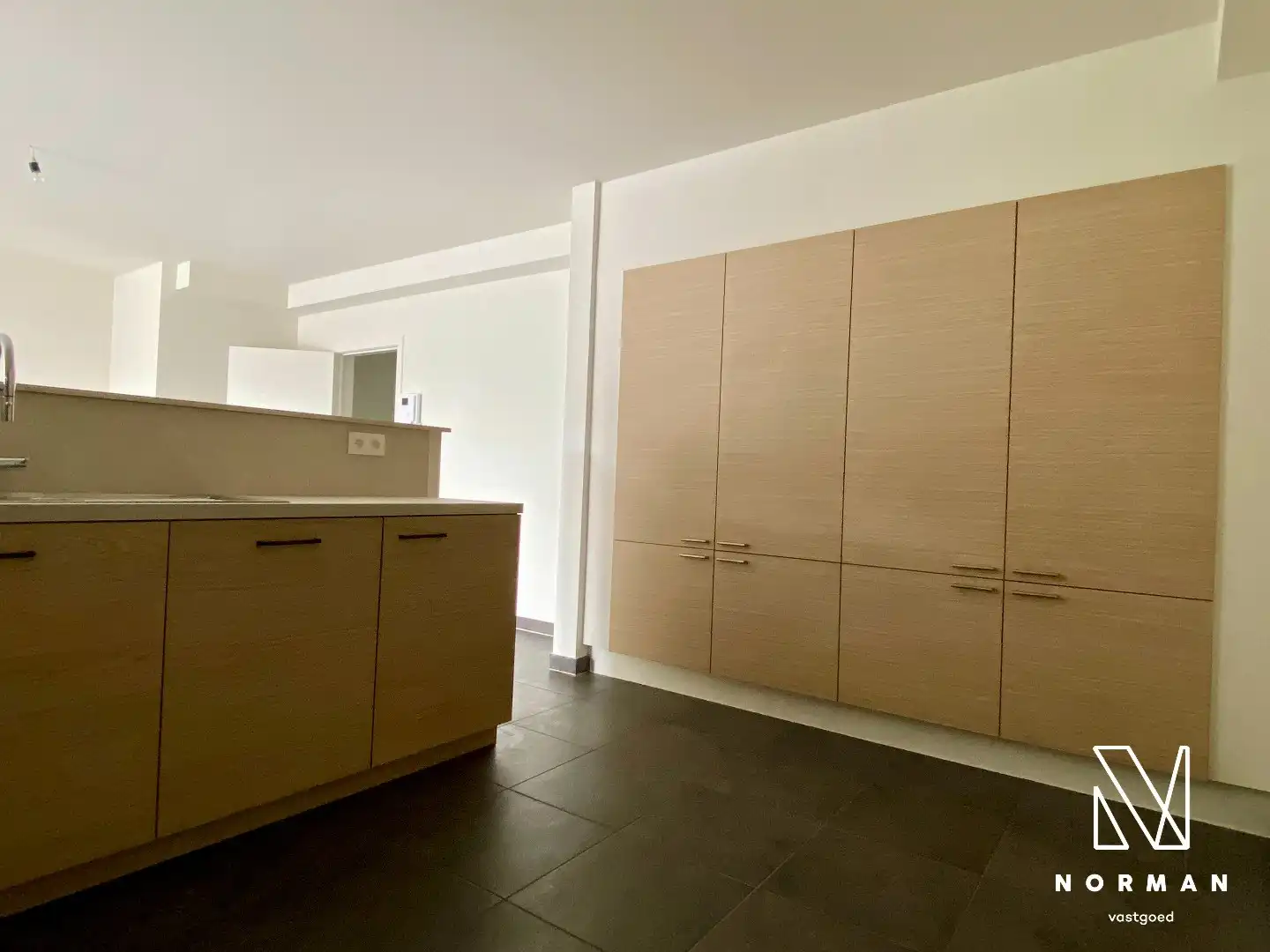 Gerenoveerd gelijkvloers appartement met 2 slaapkamers en inpandige garage en zonneterras! foto 12
