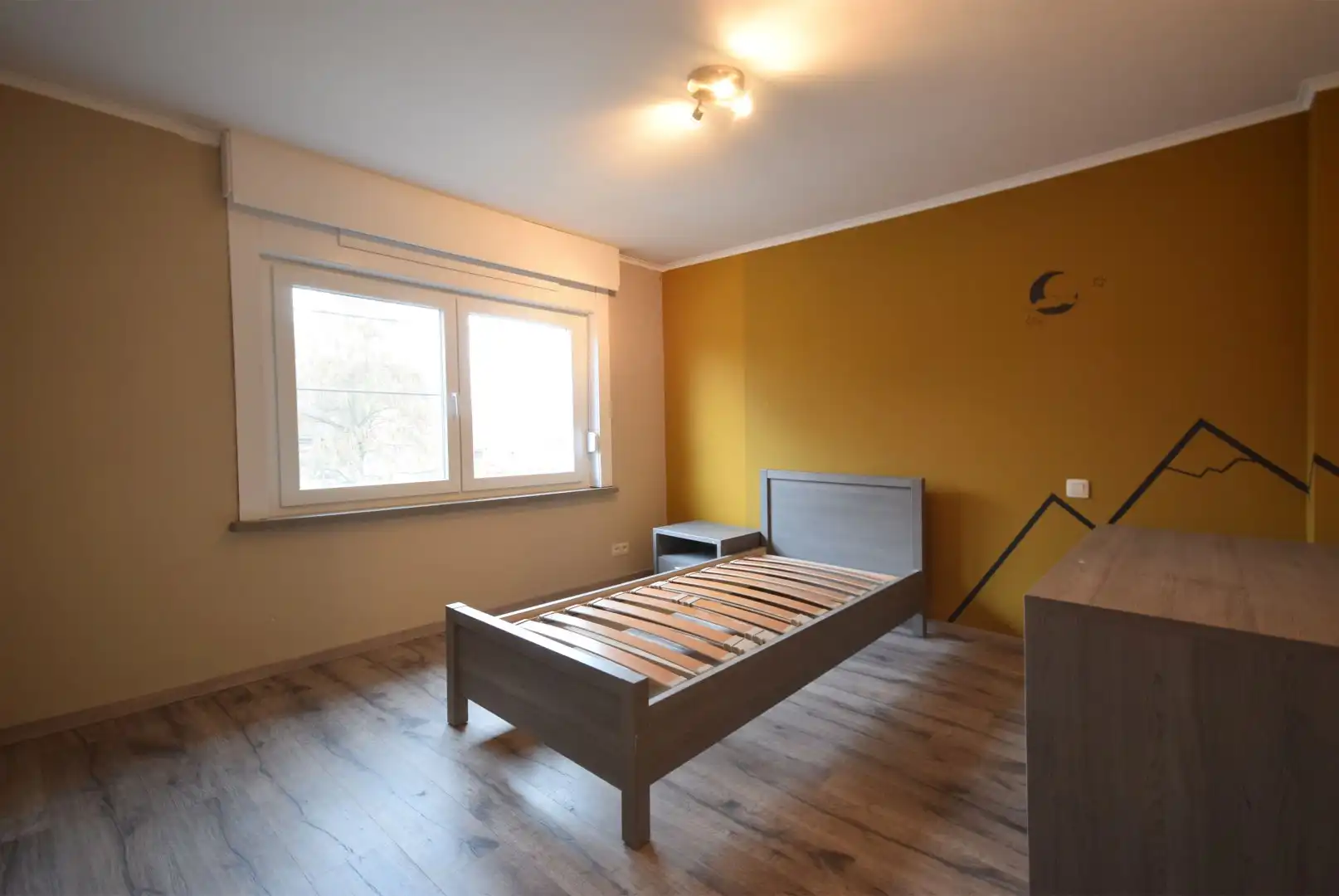 Instapklare gezinswoning met drie slaapkamers en tuin foto 12