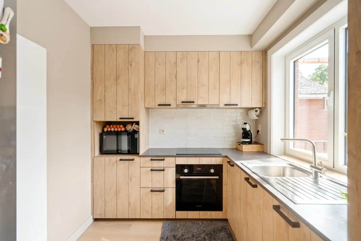 Gerenoveerd appartement met 2 slpkrs, terras en garage nabij centrum Keerbergen foto 7