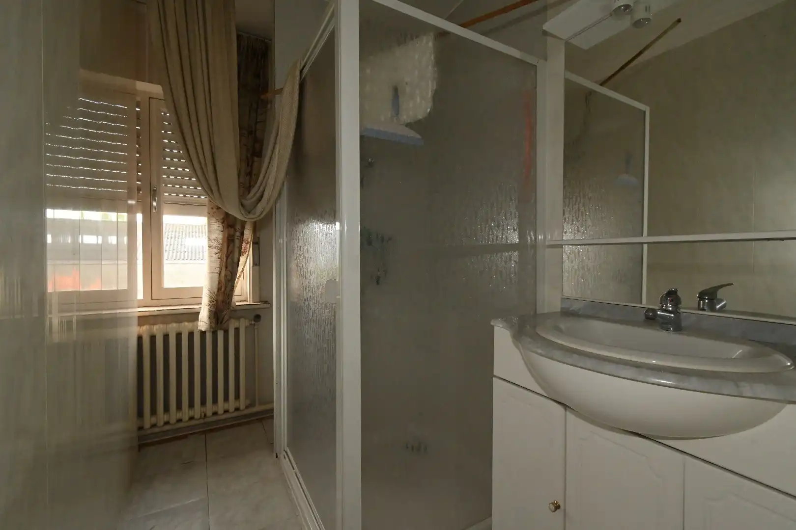 Alleenstaande woning met garage en tuin  foto 25