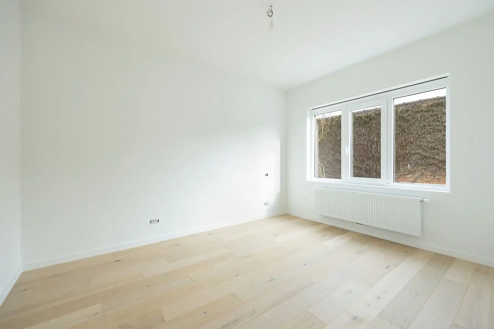 Ruim en licht 2-slaapkamerappartement met dakterras foto 21