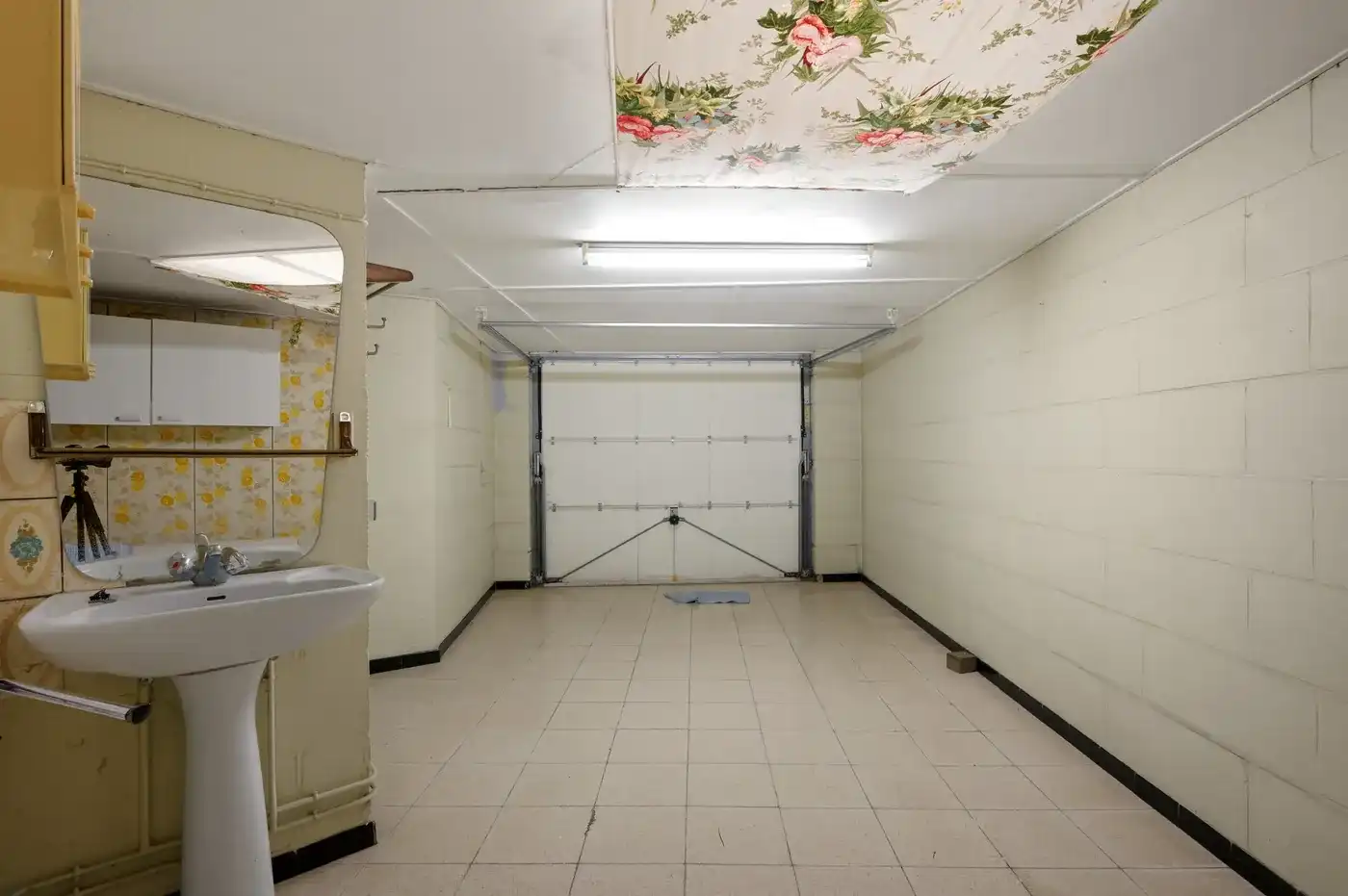 Te renoveren woning met 3 slaapkamers, garage en nabij voorzieningen foto 16