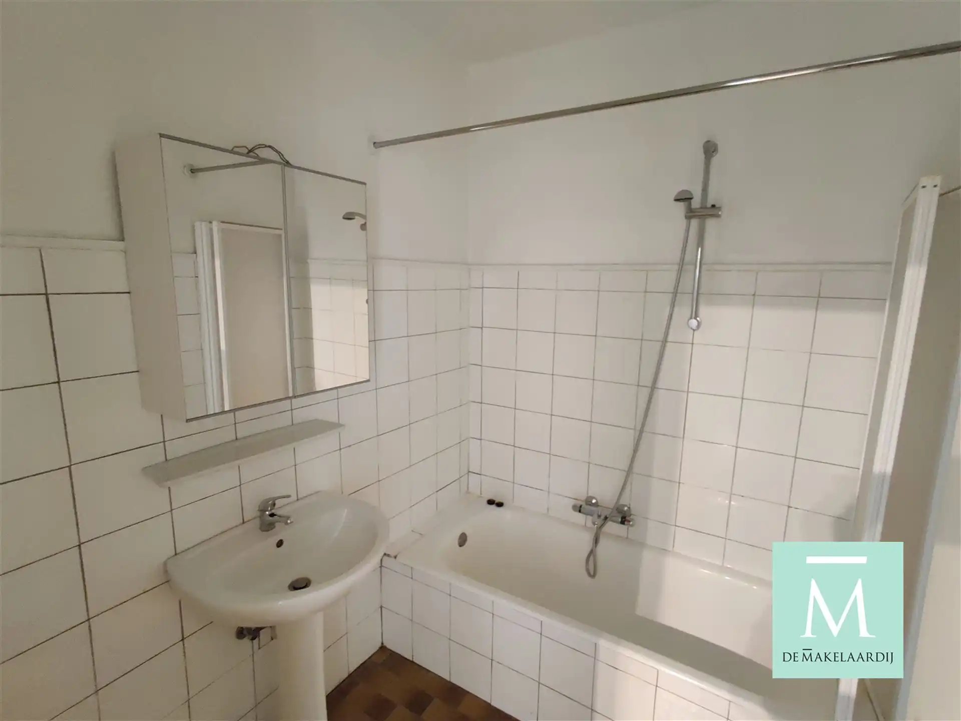 Centraal gelegen gelijkvloersappartement met 2 slaapkamers en tuin! foto 7