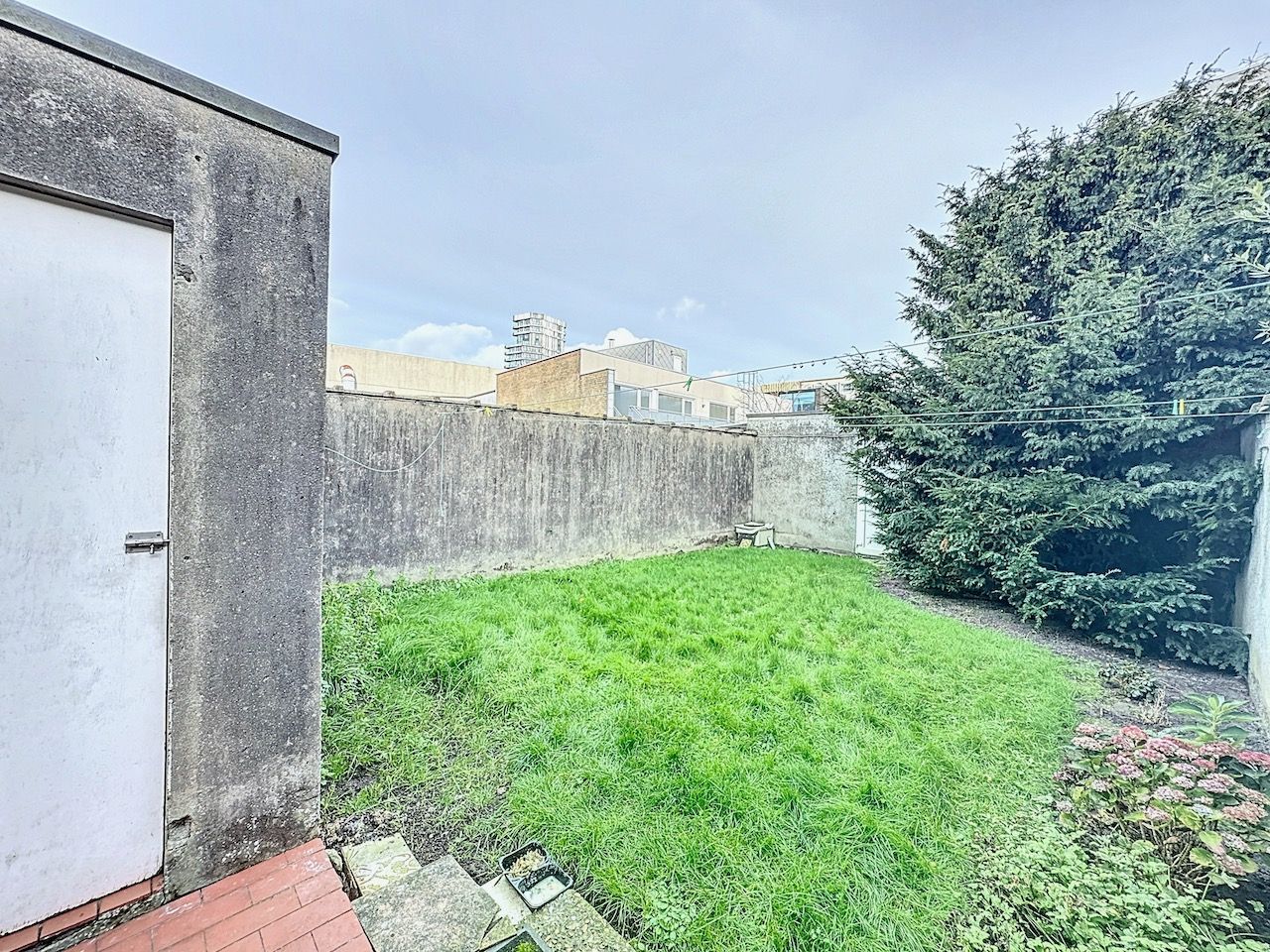Bijzonder ruim gelijkvloers appartement met mooie tuin in het centrum van Heist foto 17