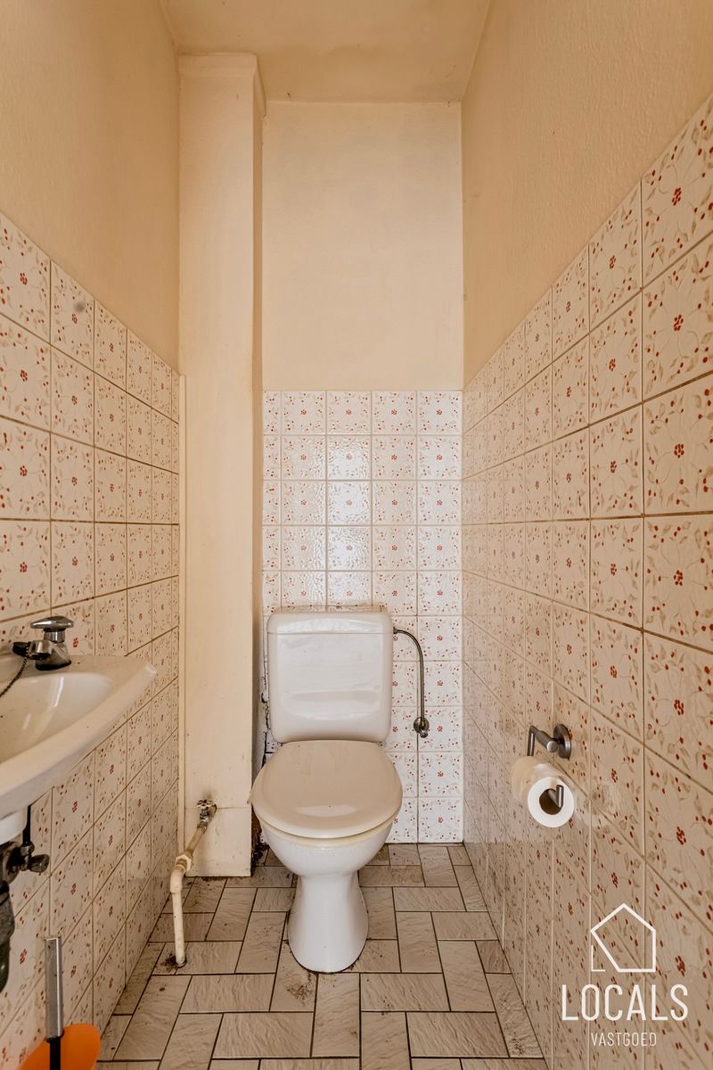 Huis ingericht als 3 appartementen te Denderleeuw foto 10