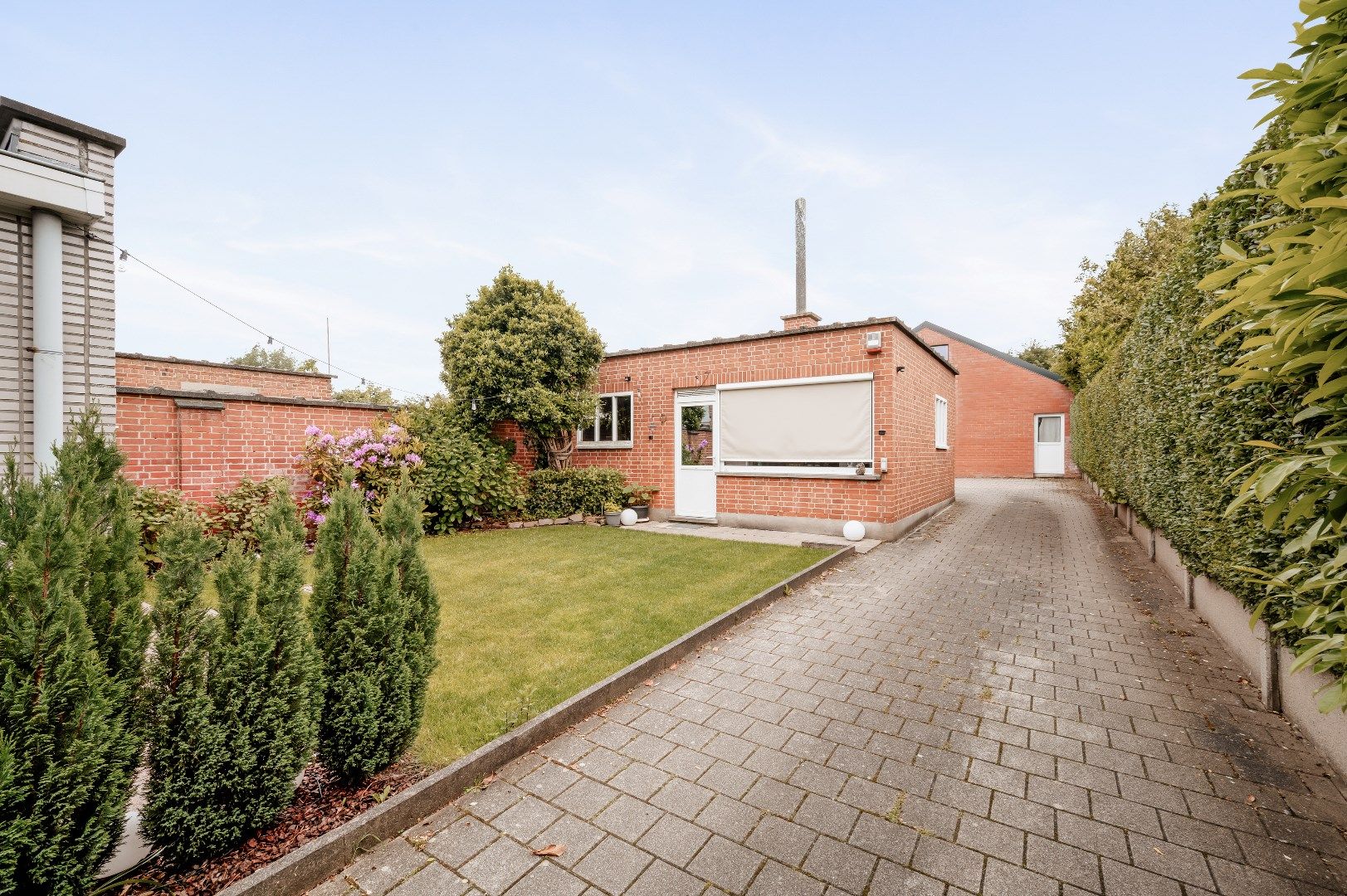 Halfopen woning met tuin, garage en loods 140m² foto 18