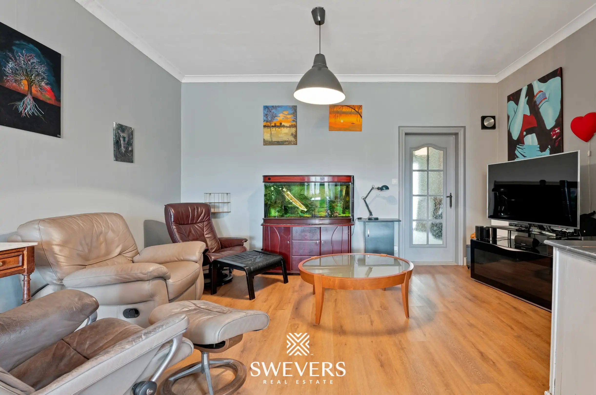 Instapklare woning met zonnige tuin in Borgloon foto 3