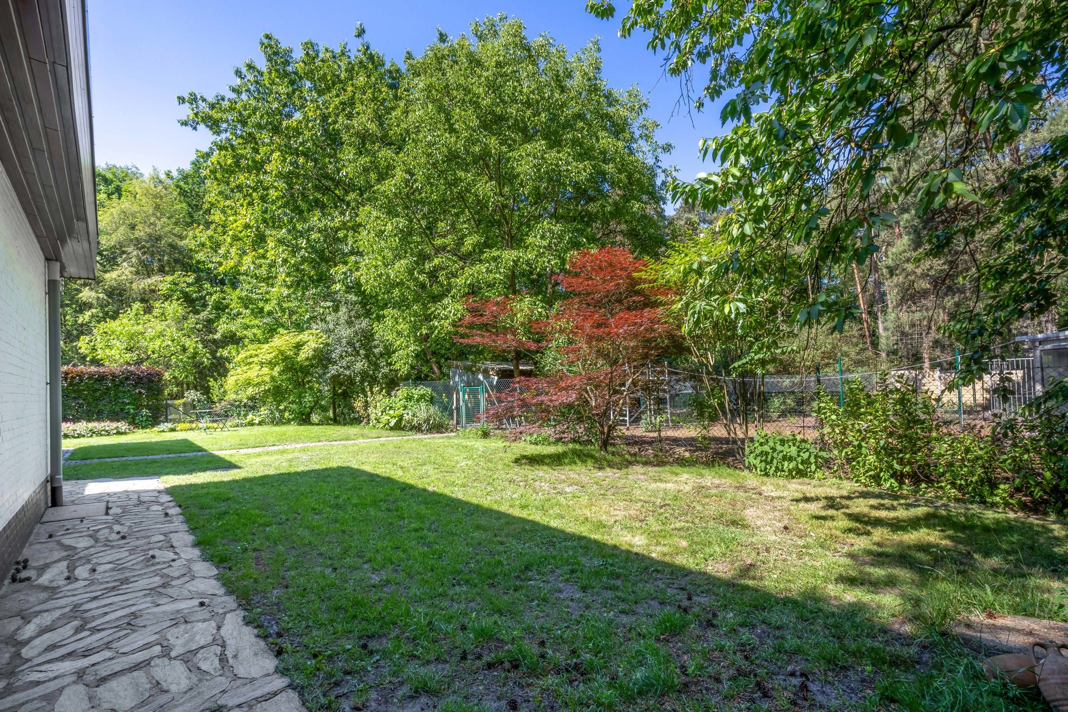 Laagbouwwoning op 2848 m² met Zwemvijver en Prachtige Tuin foto 36