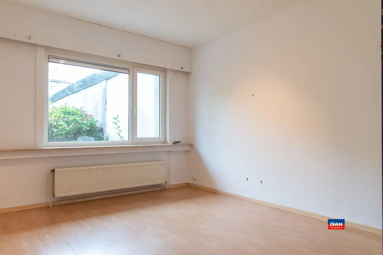 Gelijkvloersappartement met 2 spks, tuin en garage foto 7