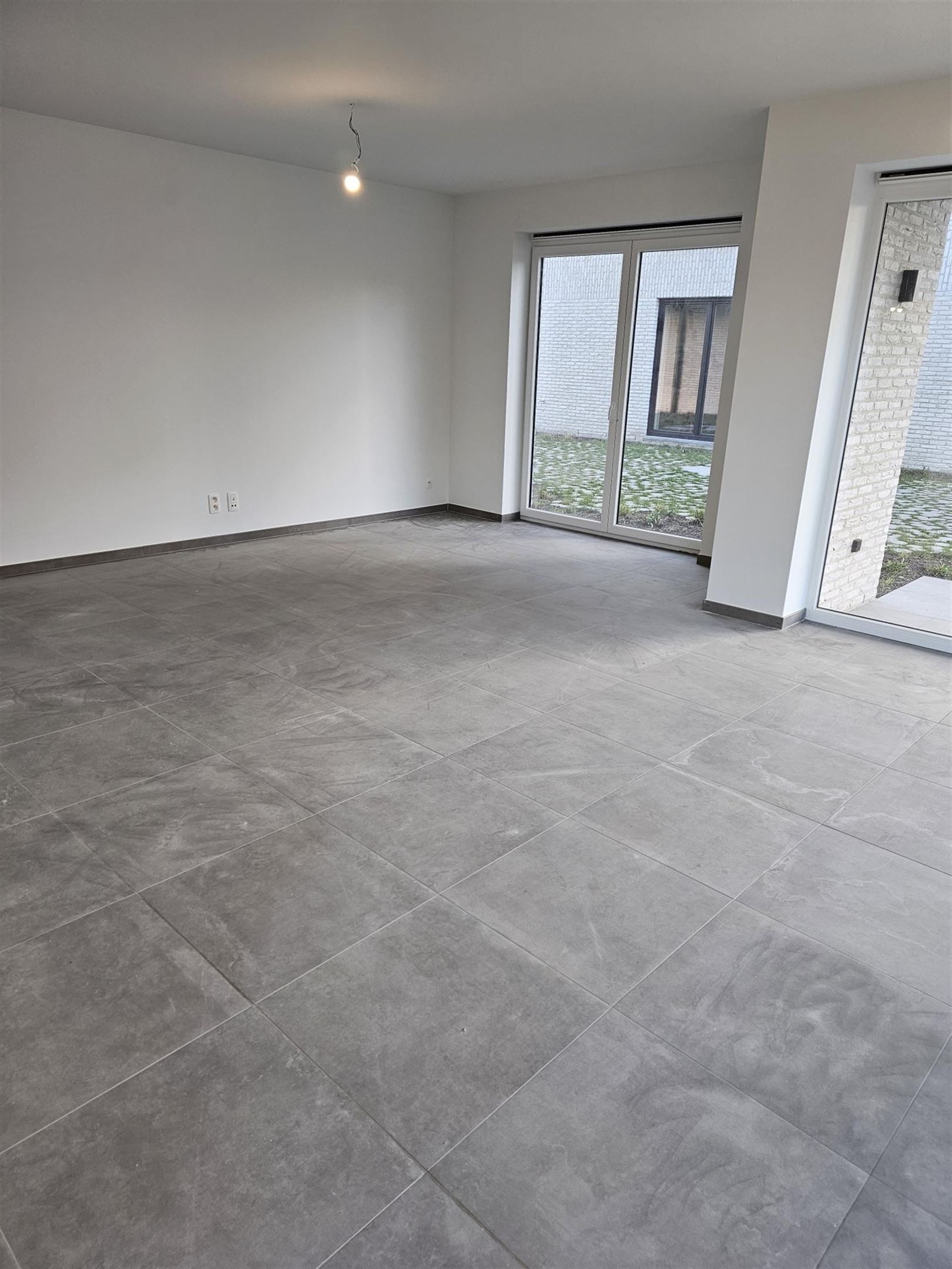 Rustig gelegen nieuwbouwappartement met één slaapkamer en ruime garage. foto 7