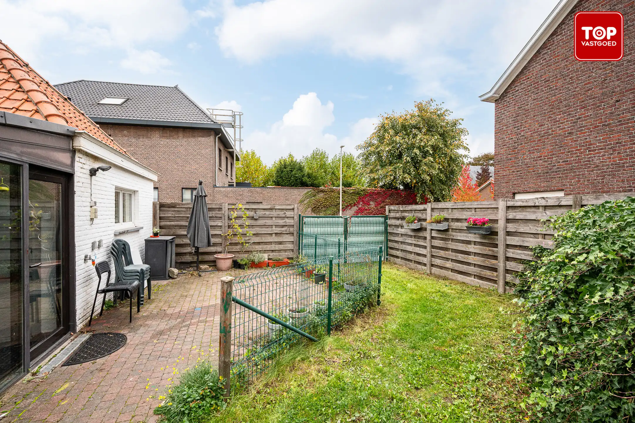 Instapklare woning met 4 slaapkamers en tuin in het hart van Sleidinge foto 14