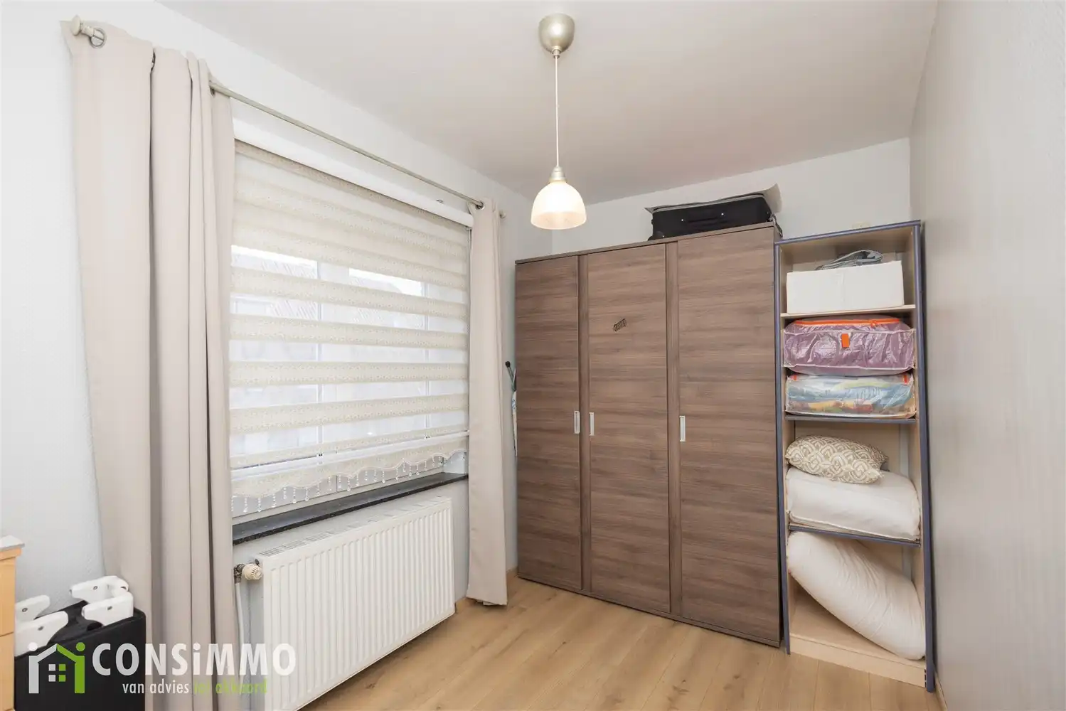 Instapklare en ruime woning met 5 slaapkamers in Genk foto 22