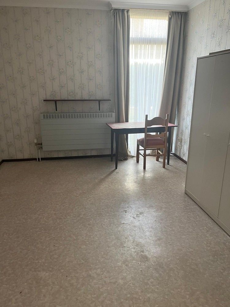 Gelijkvloerse woning met leuke stadstuin foto 6