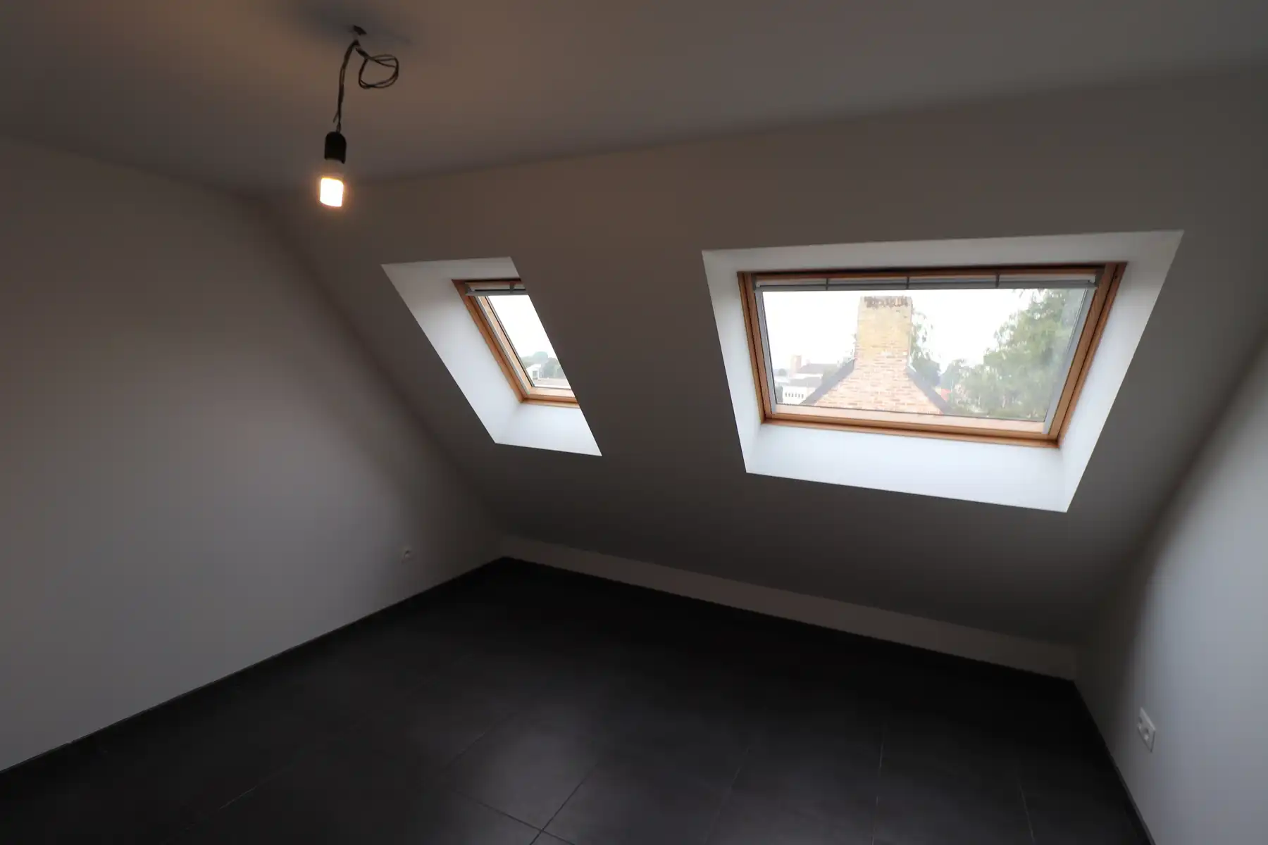 Een recent duplexappartement op de tweede en op de dakverdieping - met terras en garage. foto 9